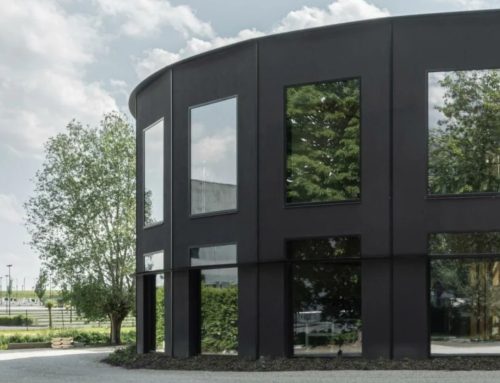 Holzrundling im Park: Bürogebäude in Kortrijk von AUX